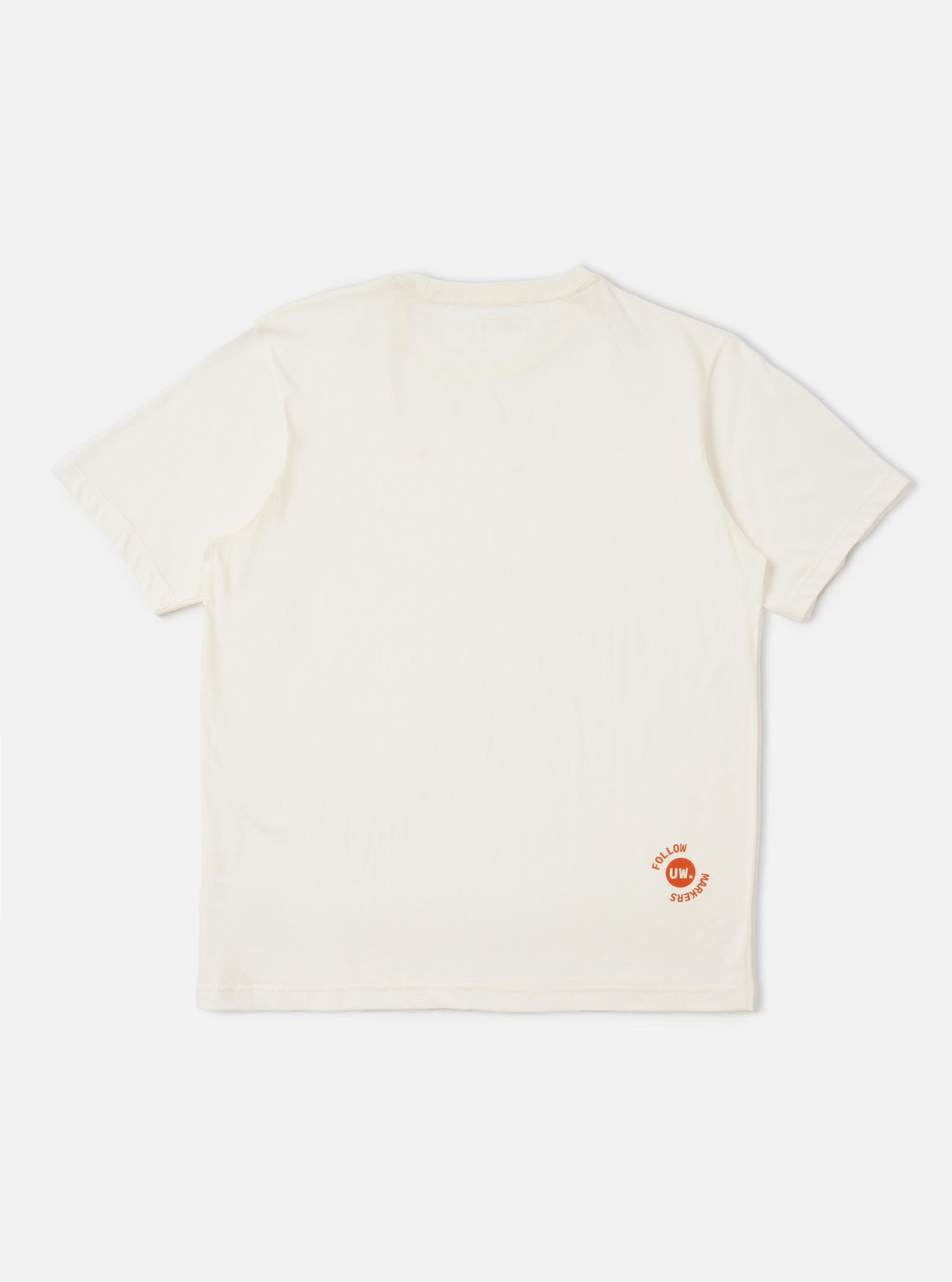 An Ecru Single Jersey Trail Trail To Hotel Delux Tee is displayed from the back, laid flat against a solid white background. The image highlights the short-sleeve construction, a clean straight hem, and a self-bound crew neck.