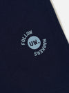 The Navy Single Jersey Trail Trail To Hotel Delux Tee is shown from a rear perspective, laid flat against a plain white background. The image highlights the clean finish of the back of the navy blue cotton t-shirt, including the ribbed crew neck and straight hem.