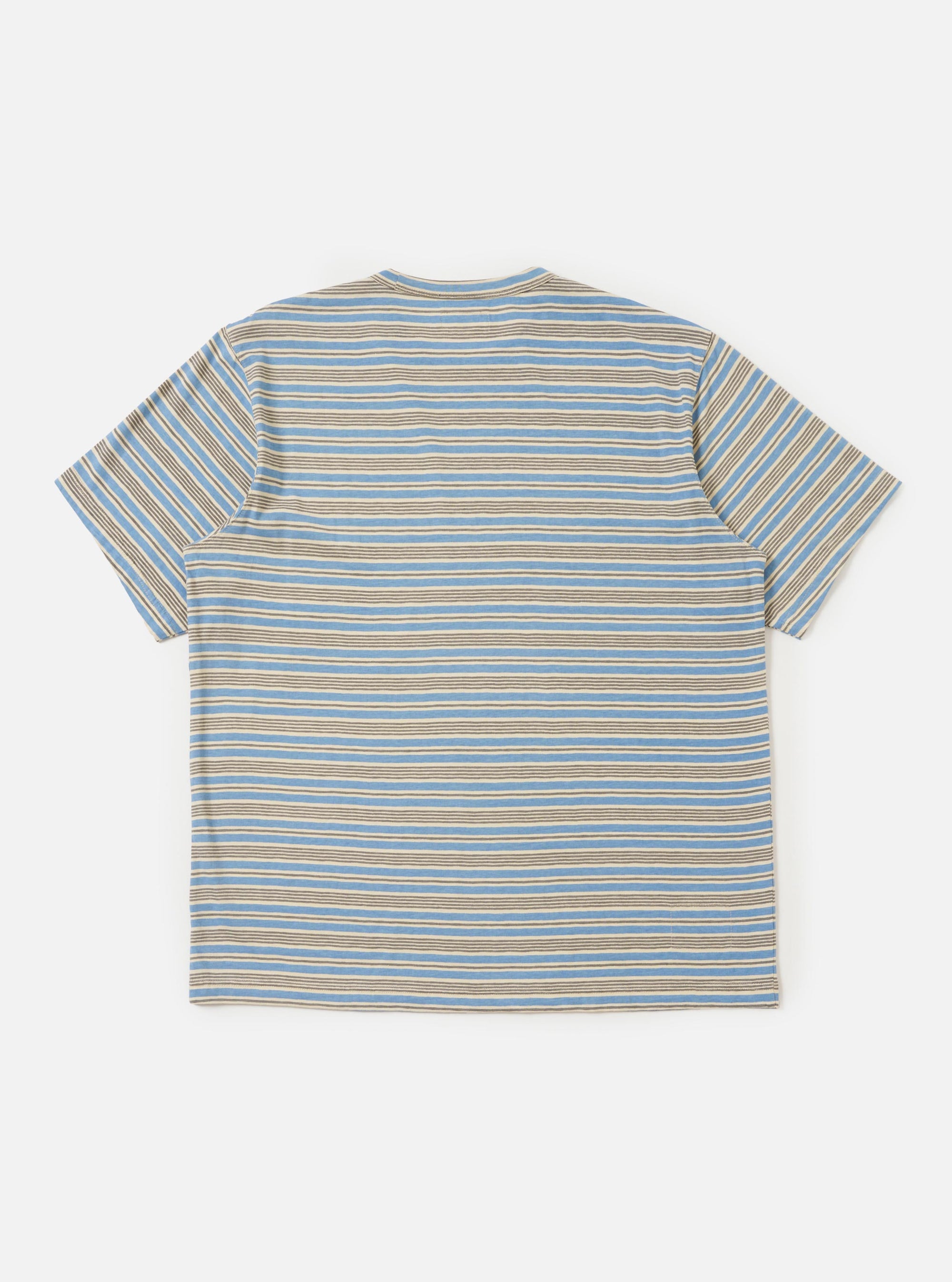 The Pale Blue OS Stripe Jersey Core Tee is shown from the back, laid flat against a plain white background. The image highlights the horizontal light blue and white stripes, the short sleeves, and the clean, straight hem of the garment.