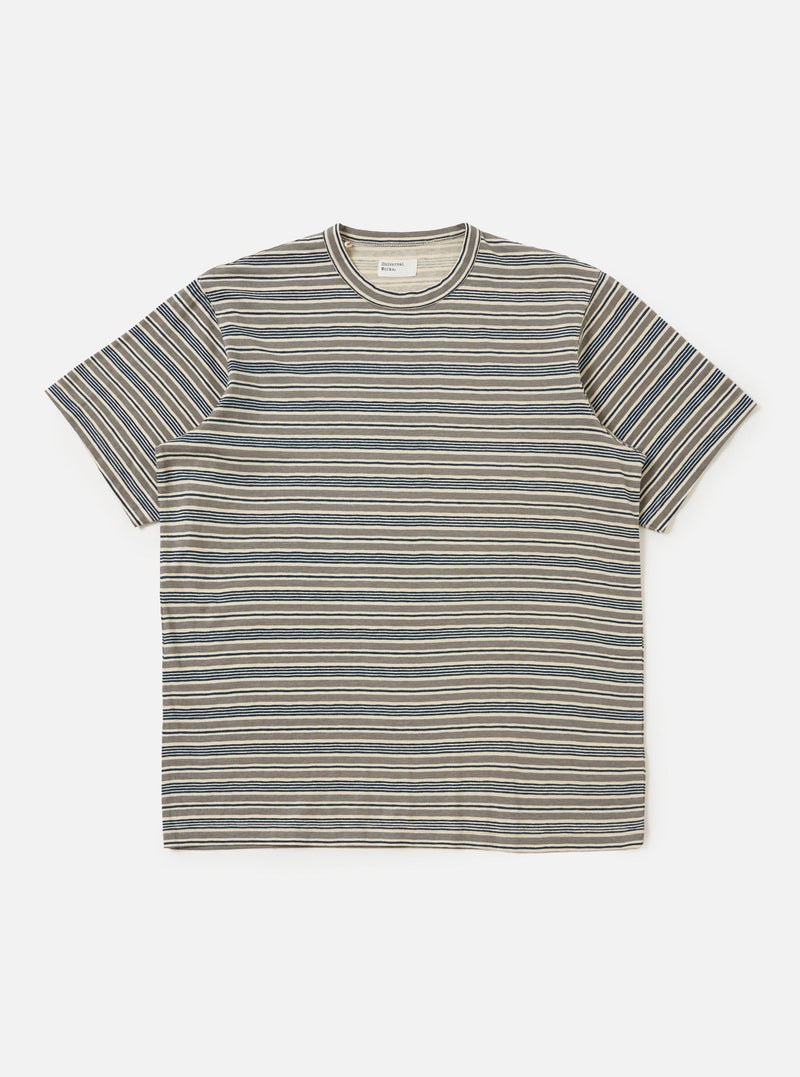 The Grey OS Stripe Jersey Core Tee is shown laid flat against a solid white background. The short-sleeved t-shirt features a light grey base with irregular, hand-painted style charcoal grey horizontal stripes. It has a classic crew neck with a self-bound collar.