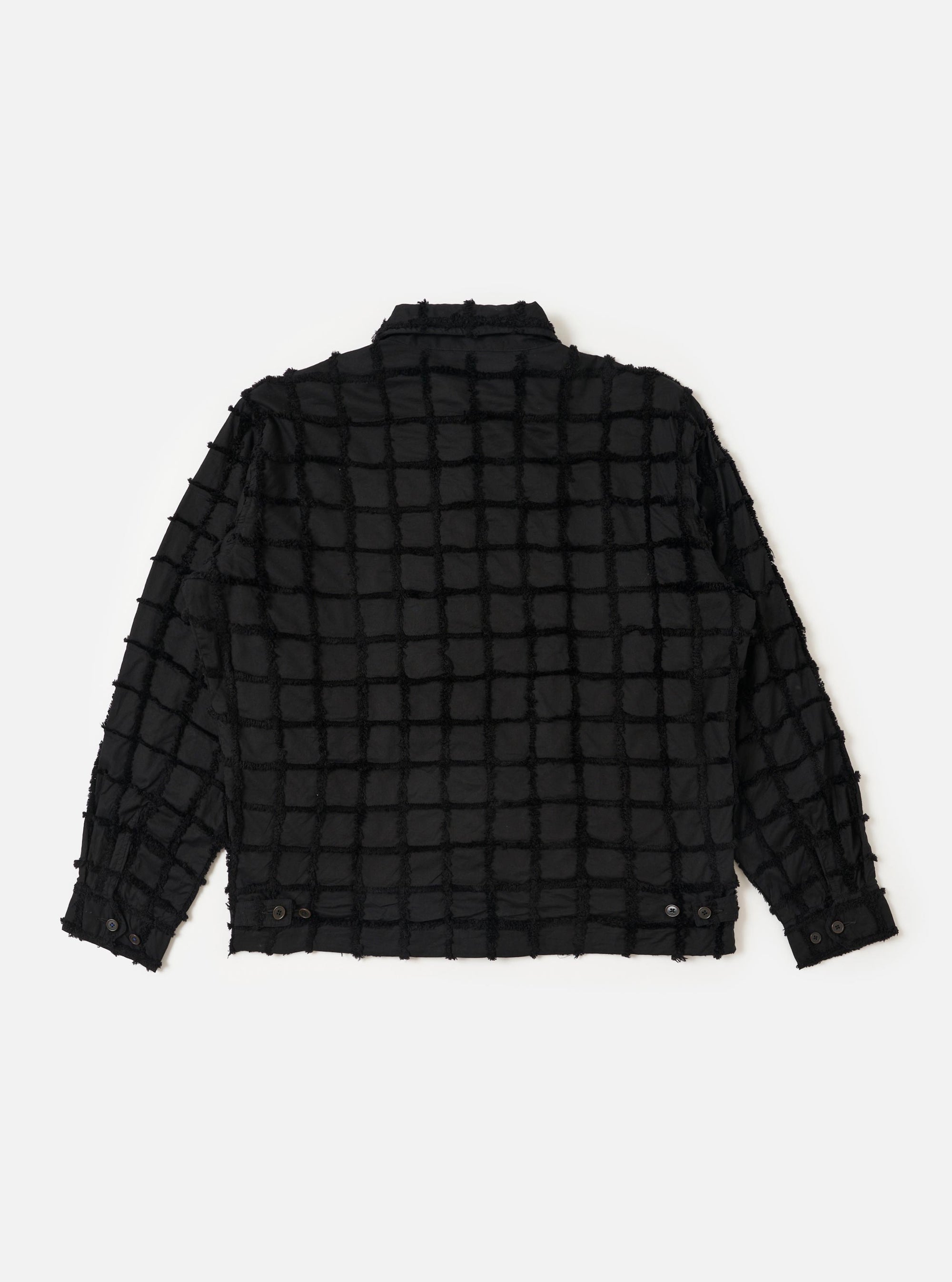 The back of the Black 3D Check Windcheater Jacket is shown from a rear perspective, laid flat against a plain white background. The image highlights the jacket's short, coach-style silhouette, a classic pointed collar, and the textured 3D check pattern of the black fabric.