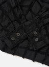 The Black 3D Check Windcheater Jacket is shown from the back, laid flat against a plain white background. The image highlights the straight hem, the subtle texture of the 3D check fabric, and the construction of the sleeves and shoulders.