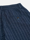 A pair of Navy Chester Stripe Oxford Pants is shown from the back, laid flat against a plain white background. The image highlights the two rear pockets, one a buttoned flap and the other a buttoned jetted pocket, as well as the elasticated drawstring waistband.