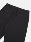 Close-up of the back of the Black Twill Fatigue Pant (Undarted) on a white background. The black twill fabric shows two buttoned pockets and adjustable waist tabs.