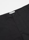 Close-up of the Black Twill Fatigue Pant (Undarted) on a white surface. The dark twill fabric and classic cut are clearly visible.