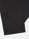 Close-up of the Black Twill Fatigue Pant (Undarted) on a white surface. The dark, durable twill fabric is clearly visible, showcasing the pant's clean lines and classic fit.