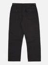 Back view of the Black Twill Fatigue Pant (Undarted) on a white background. These black pants have a relaxed fit and feature two back pockets with button closures.