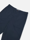Close-up of the Navy Twill Fatigue Pant (Undarted) on a white background. The pants are a dark navy color and made of twill fabric, with large pockets.