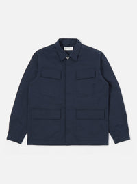 The Navy Twill MW Fatigue Jacket in navy twill on a white background. The jacket has a button closure and four front pockets.
