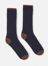 Two Navy Wool Hike Sock on a white background. The socks are ribbed and have brown toes and cuffs.