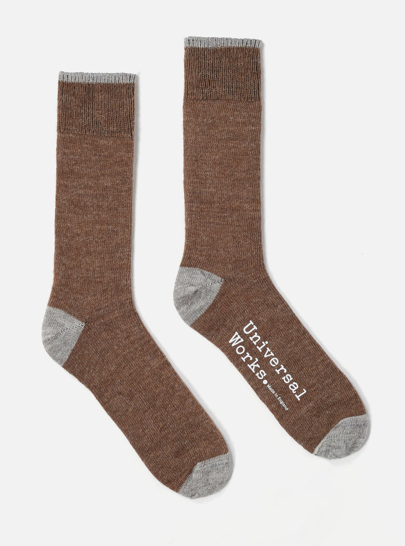 Two Brown Alpaca Wool Socks on a white background. The socks have gray toes and cuffs.