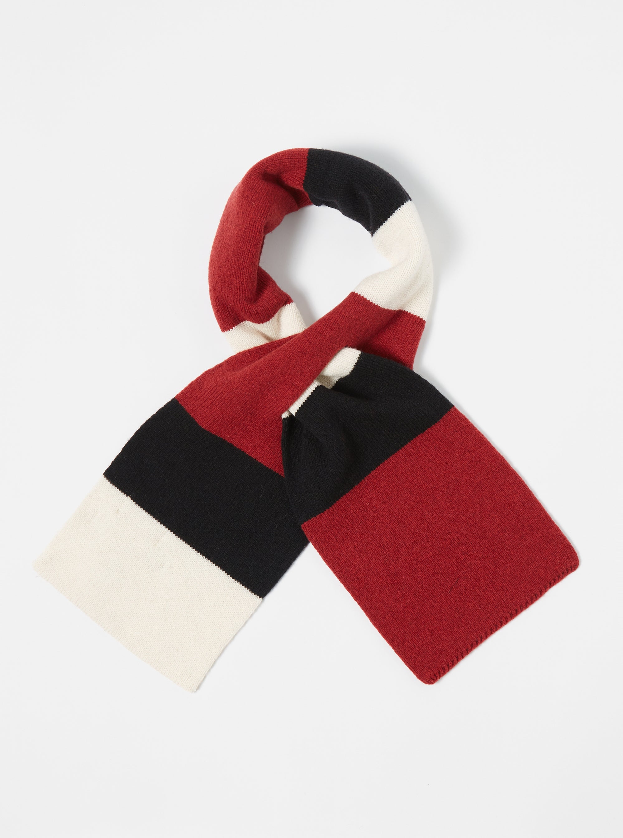 The Black/Red/Ecru Soft Wool Deluxe Football Scarf is displayed on a white background. The scarf features alternating stripes of black, red, and ecru wool.
