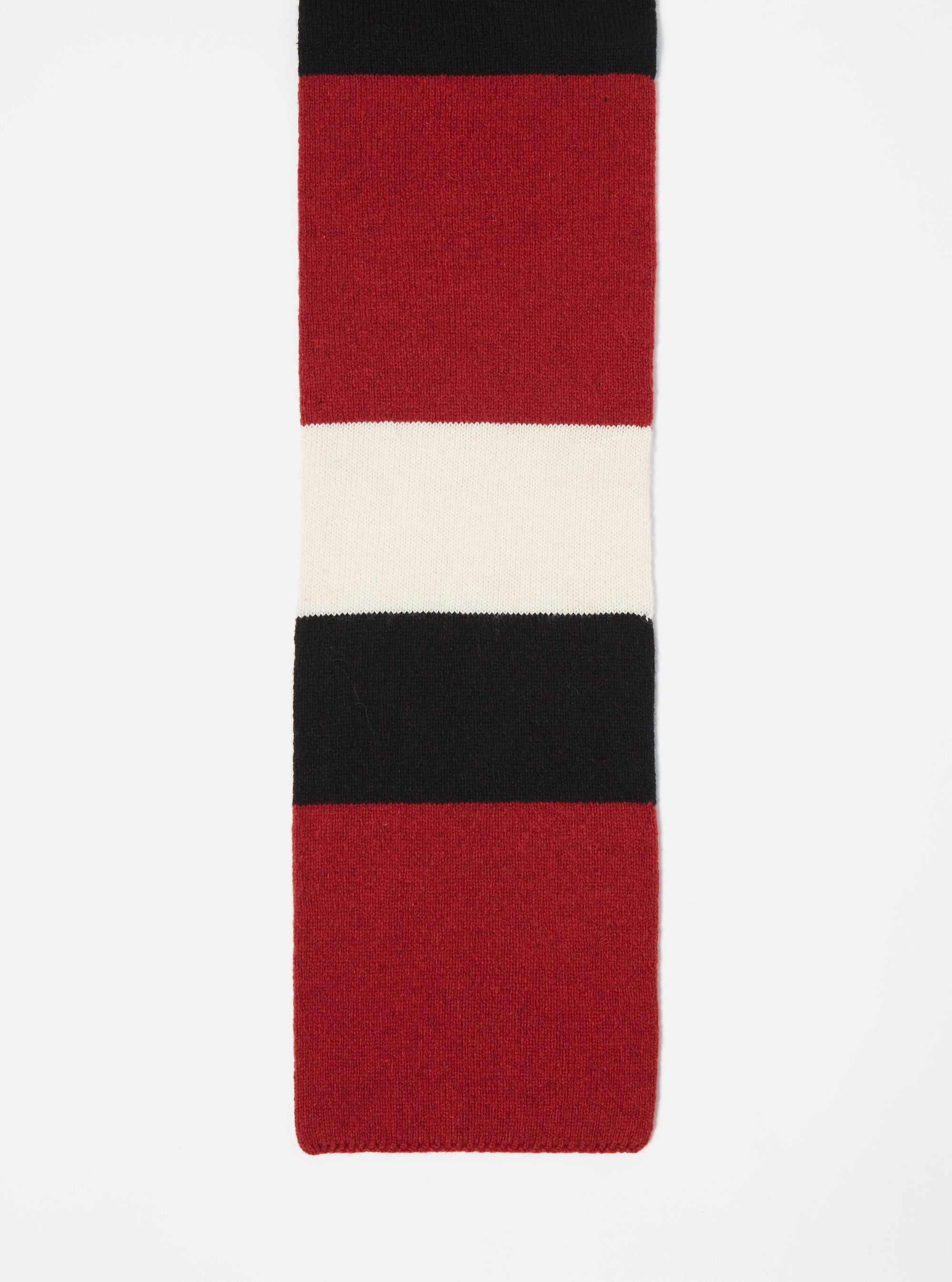 Close-up of the Black/Red/Ecru Soft Wool Deluxe Football Scarf on a white background. The scarf features bold color blocks.