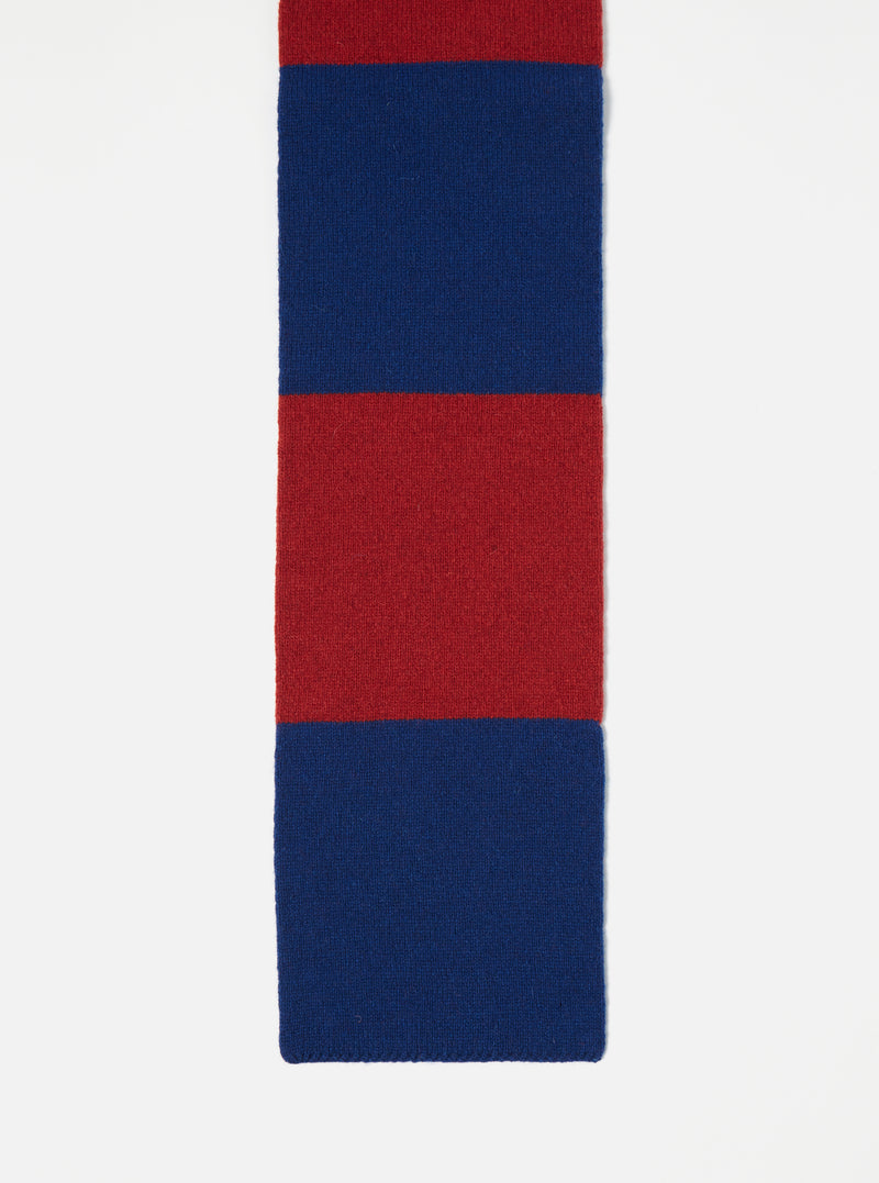 Close-up of a Red/Blue Soft Wool Deluxe Football Scarf on a white background. The scarf features alternating red and blue stripes, showcasing its soft wool texture.