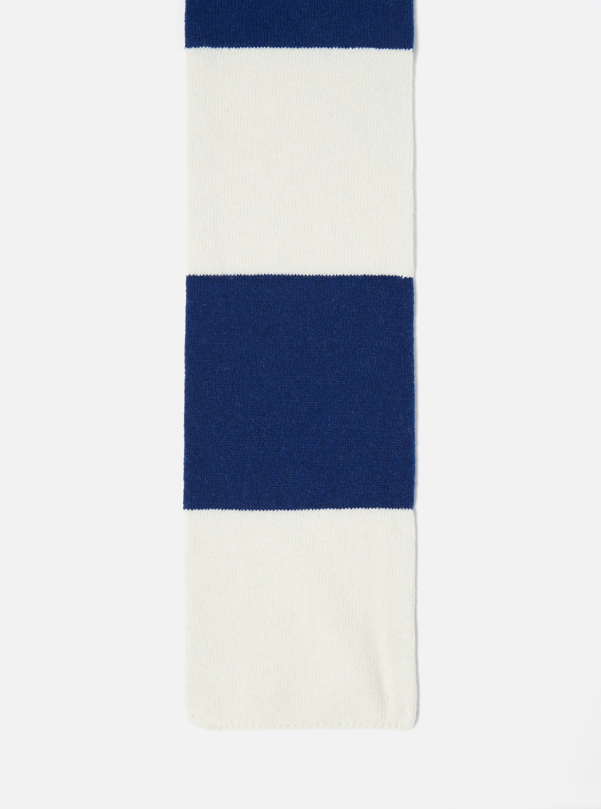 Close up of the Ecru/Blue Soft Wool Deluxe Football Scarf on a white background. The scarf has alternating ecru and blue stripes.
