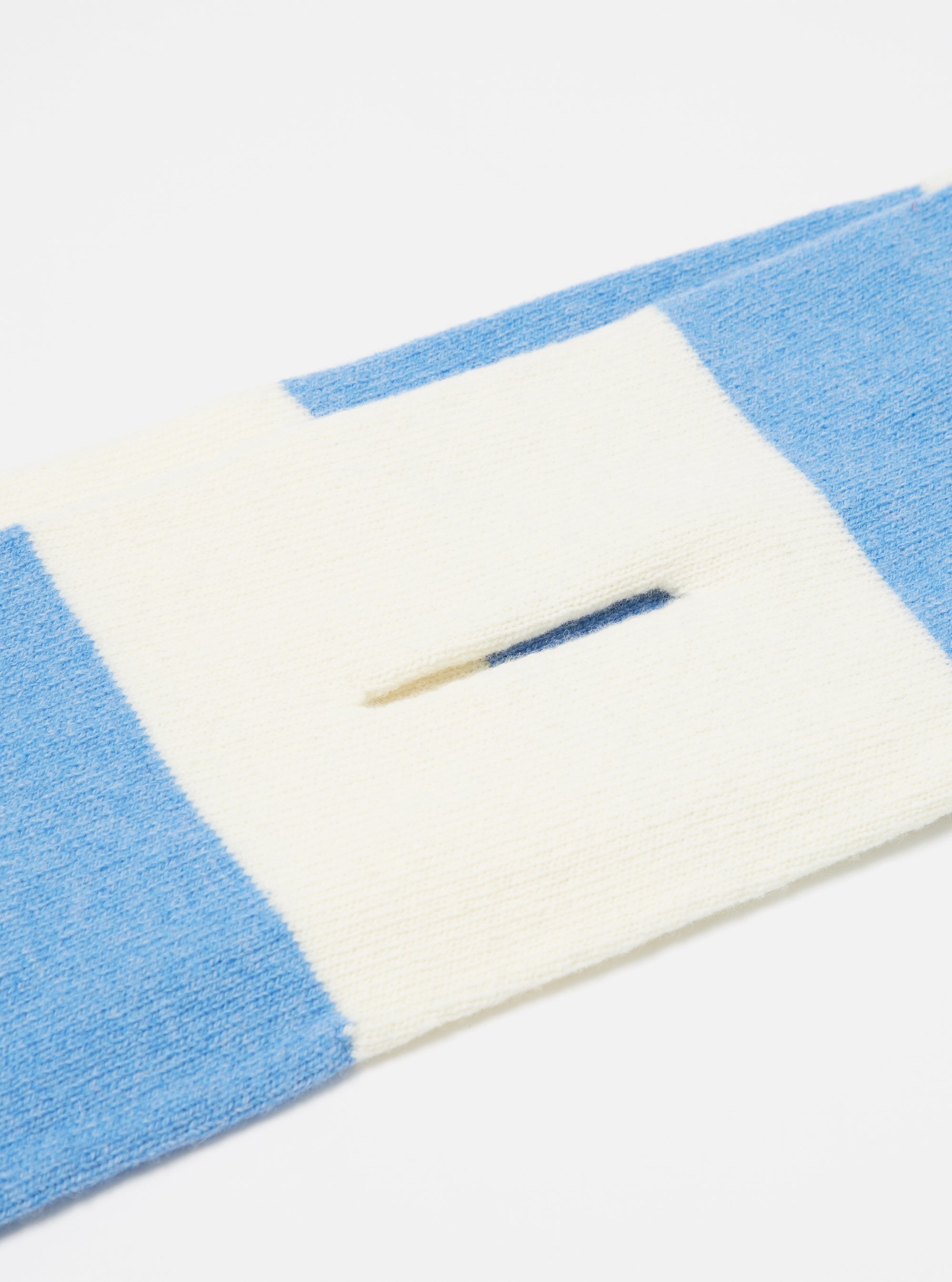Close-up of the Ecru/Sky Soft Wool Deluxe Football Scarf on a white background. The scarf features ecru and sky blue stripes in a soft wool knit.