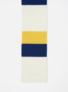 Close-up of the Ecru/Yellow/Blue Soft Wool Deluxe Football Scarf on a white surface. The scarf features horizontal stripes in ecru, yellow, and blue wool.