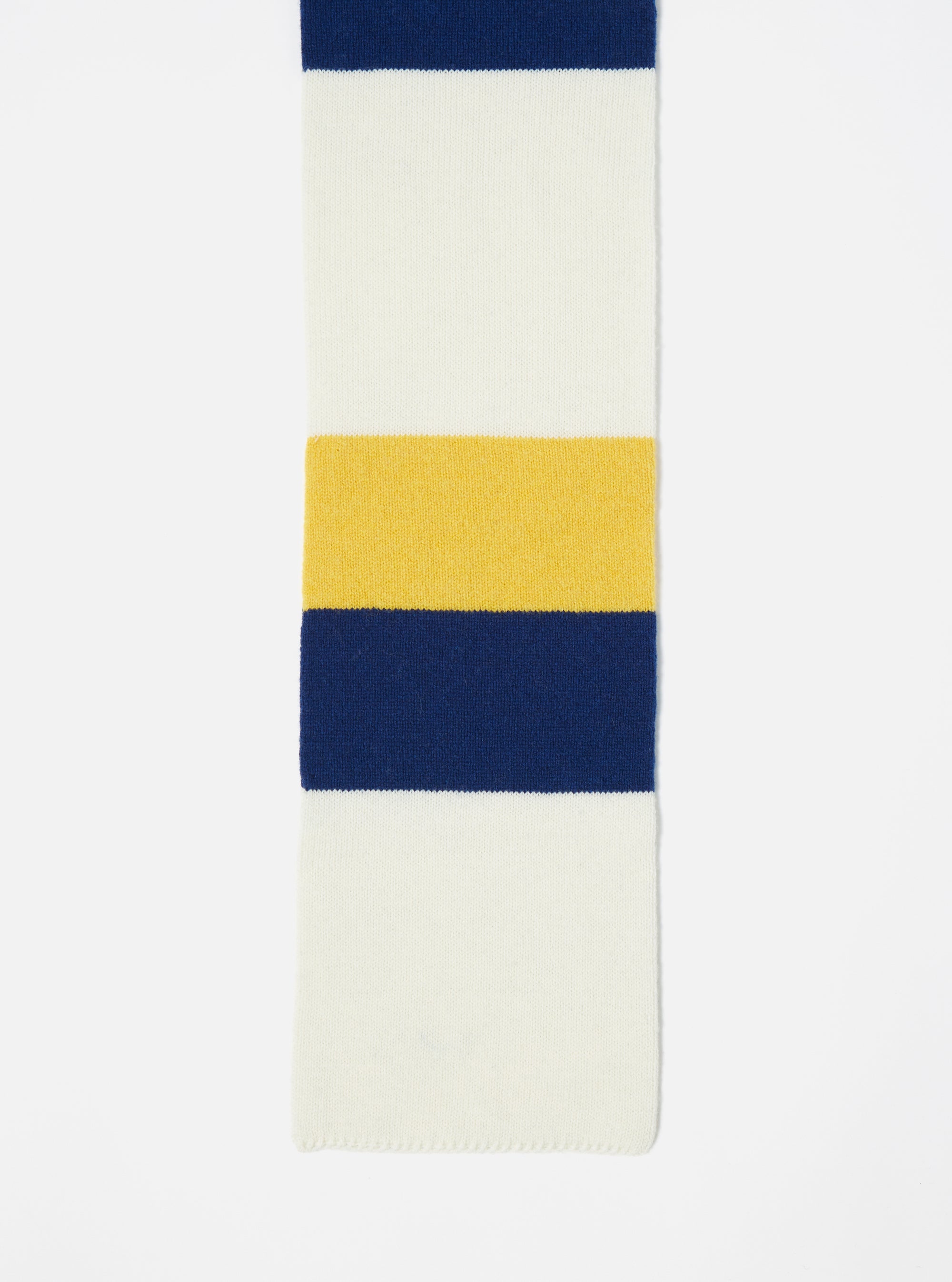 Close-up of the Ecru/Yellow/Blue Soft Wool Deluxe Football Scarf on a white surface. The scarf features horizontal stripes in ecru, yellow, and blue wool.