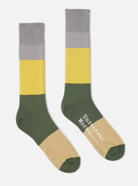 The Grey/Gold Cotton Bold Stripe Sock on a white background. The sock features grey, gold, and green stripes.