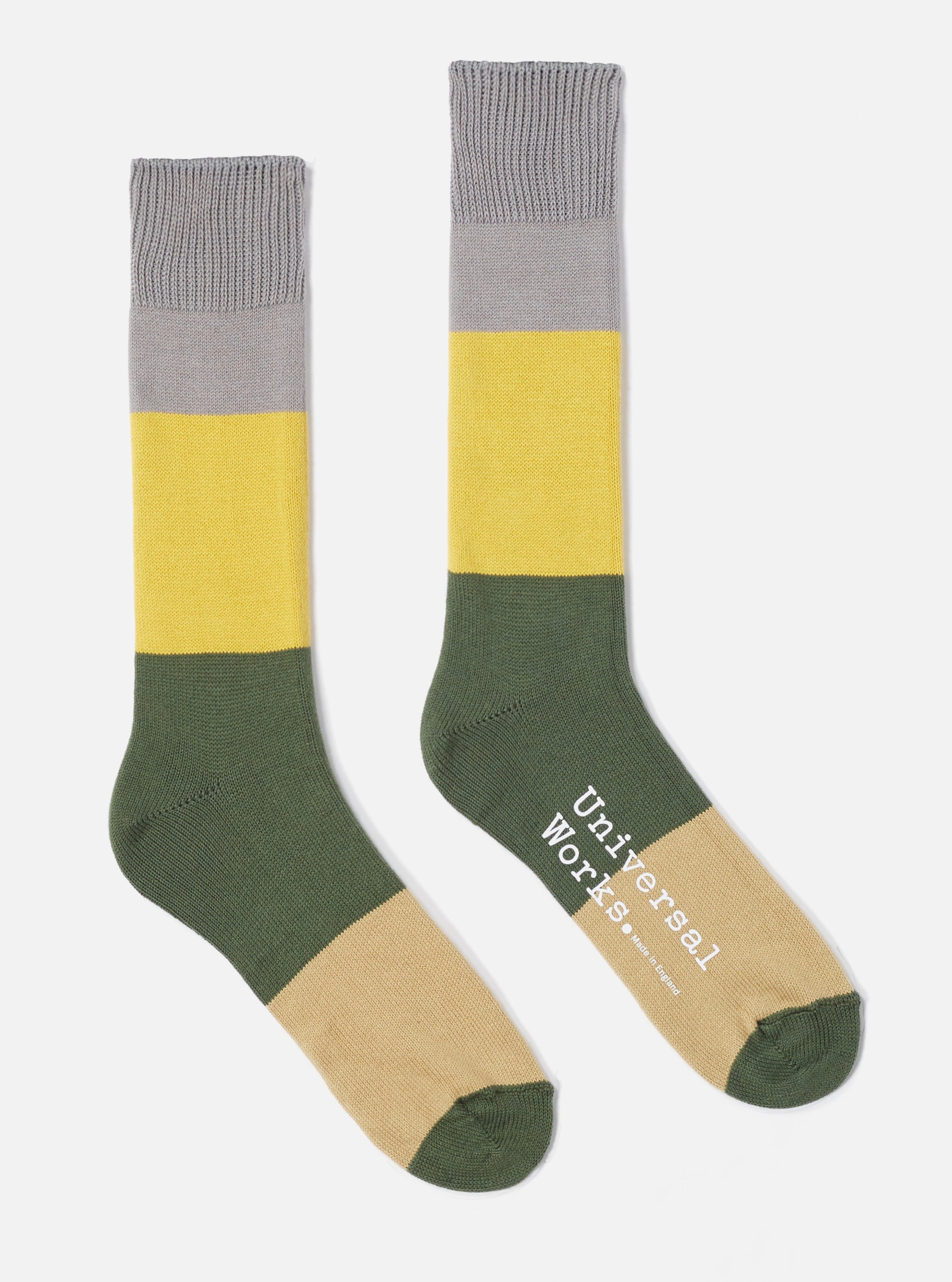 The Grey/Gold Cotton Bold Stripe Sock on a white background. The sock features grey, gold, and green stripes.
