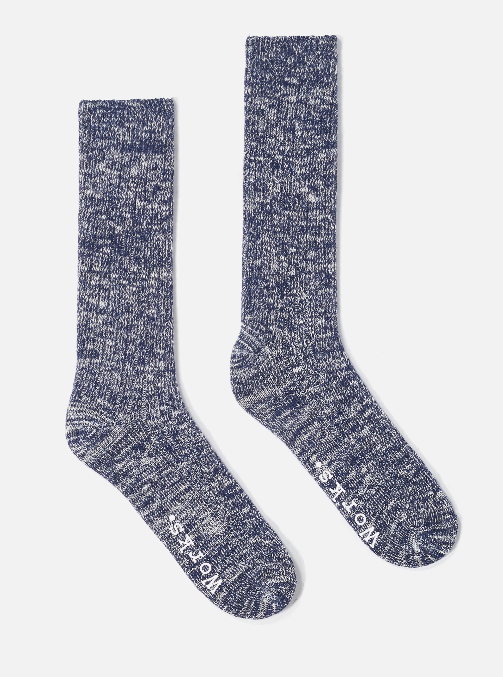Two Navy Slub Knit Slub Socks are displayed on a white background. The socks have a ribbed texture and a heathered navy and white color. 