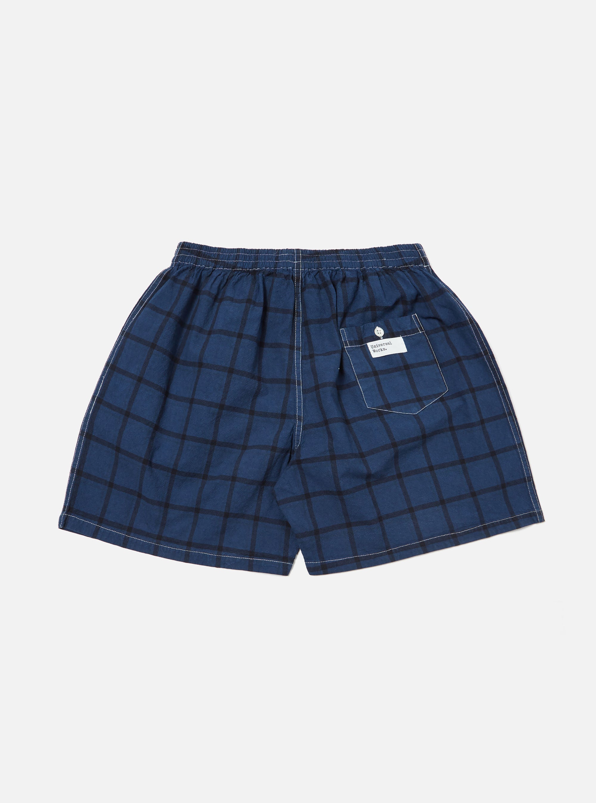 Back view of the Blue Check Boxer Short on a white background. The shorts are blue with a black check pattern and have an elastic waistband.