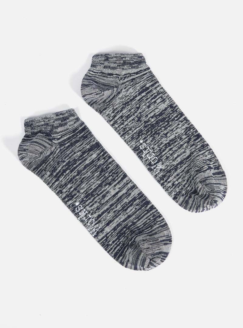 Two Navy Slub Knit Ankle Slub Sock on a white surface. The socks are a blend of navy and white knit, perfect for a casual, comfortable fit.