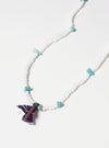 Hanami of Rome Bandana Necklace/Bracelet No.30 on a white surface. Features white beads, turquoise stones, and a navy bandana accent with brown leather.
